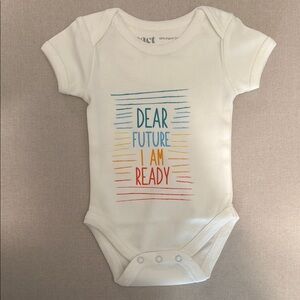 Pact newborn onesie